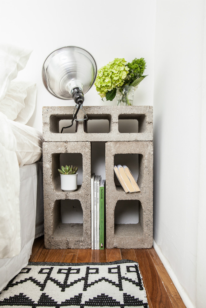 concrete block bed side table with clamp lamp